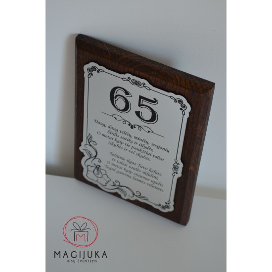 65-tasis gimtadienio sveikinimas – elegantiška dekoracija 65-ojo jubiliejaus progai.