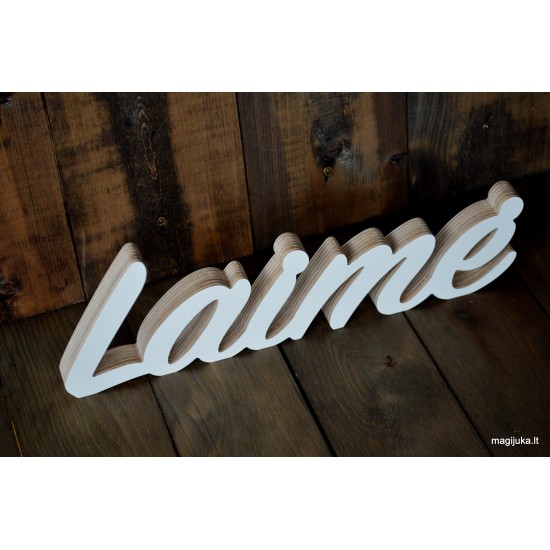 Pastatomas medinis žodis "Laimė"